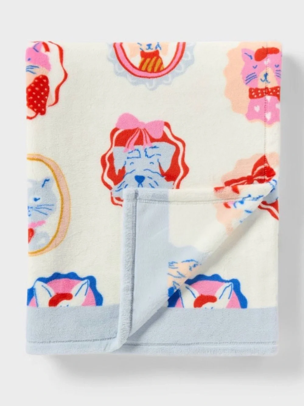 Pillowfort Patisserie Scatter Pet Shoppe Kids’ Throw Blanket Cream 60”L x 50” W